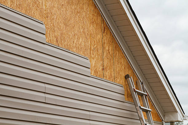 Professional Siding Installation technician working in Lemont Furnace, PA